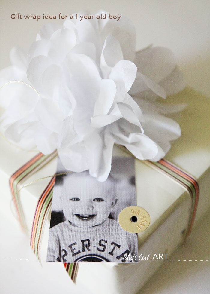 #Gift #wrap idea for a one year old. #DIY gift topper and photo tag