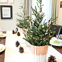 Miniature Christmas trees with garland and copper crackle finished pots