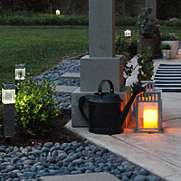 Make a lantern LED and use solar in the back-yard.