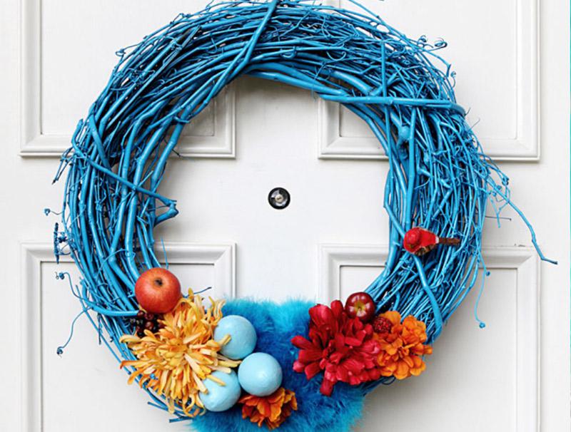 Egg and feather goes together - jewel toned Easter door wreath