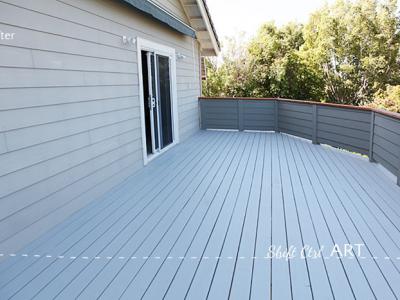 Deck off the master - repaired, planed, painted.  