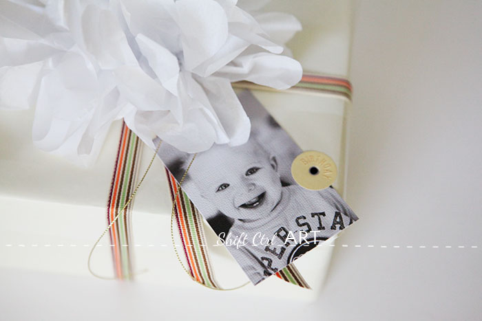 Gift wrap idea for a one year old photographers playground action gift tag