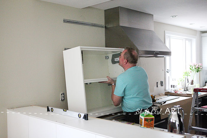 Kitchen installation IKEA Caesar counter tops Delta touch 2.0