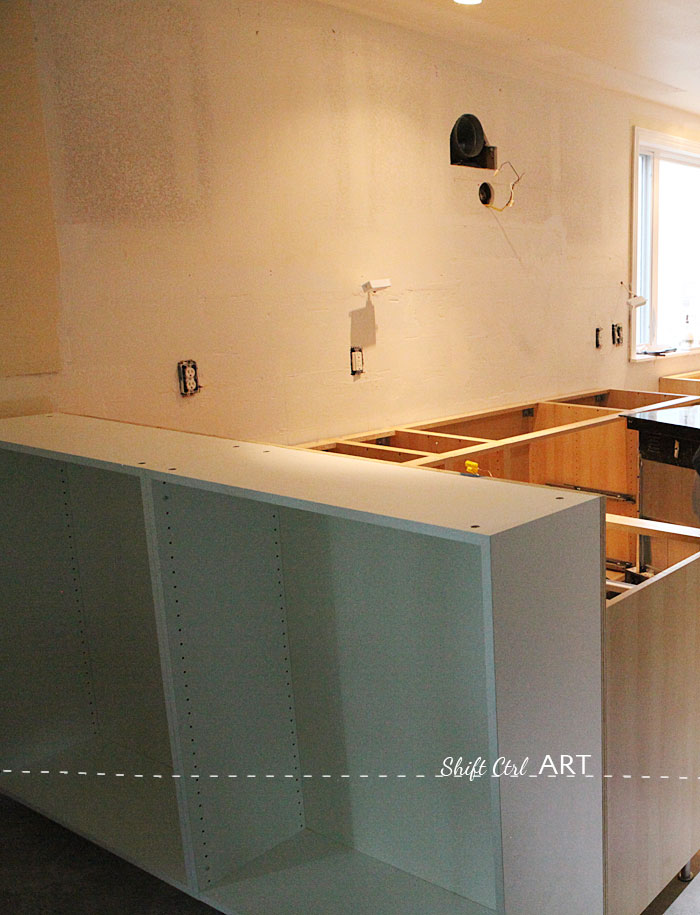 Kitchen installation IKEA Caesar counter tops Delta touch 2.0