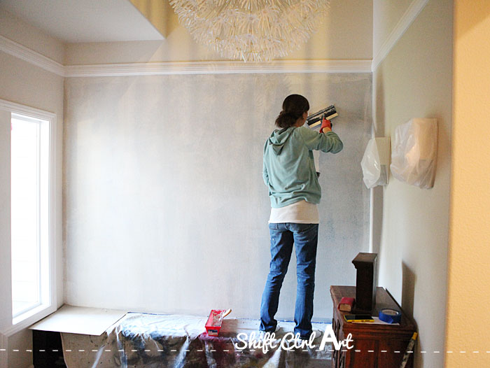 Premium Photo  Young caucasian couple removing old wallpaper from walls  preparing for flat renovation