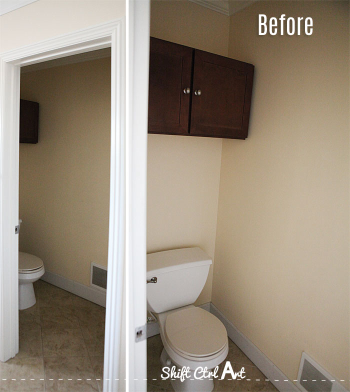 Toilet room a Bondo experiment and new paint and cabinet 1