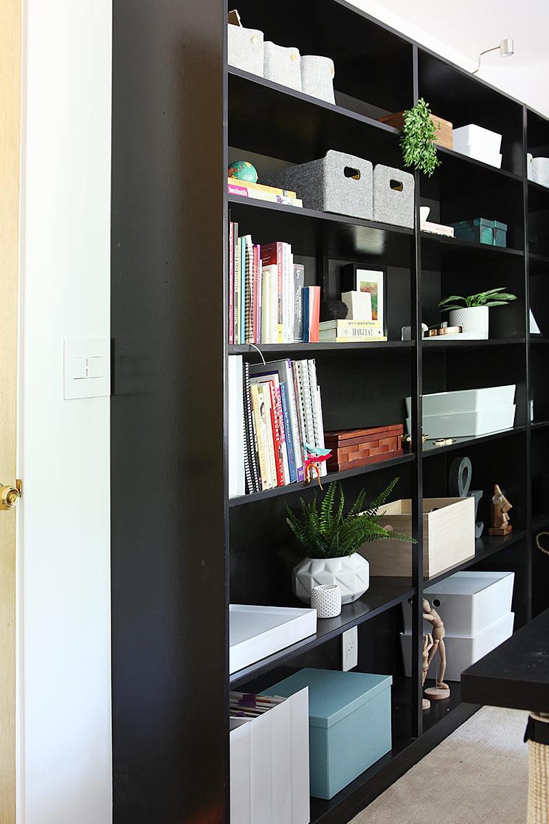 Office reveal book shelf installed and new lighting and speakers in ceiling