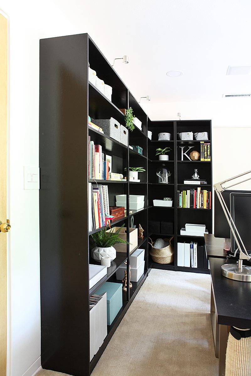 Office reveal book shelf installed and new lighting and speakers in ceiling