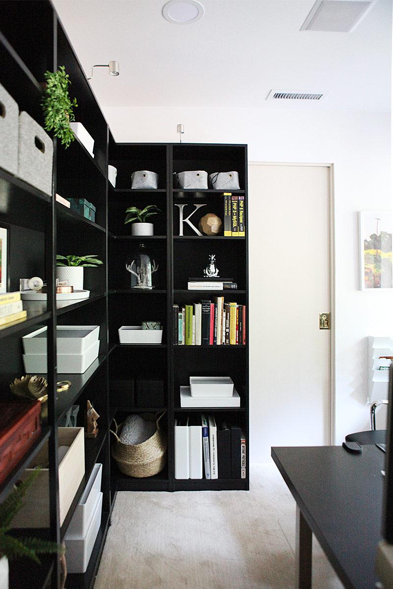 Office reveal book shelf installed and new lighting and speakers in ceiling